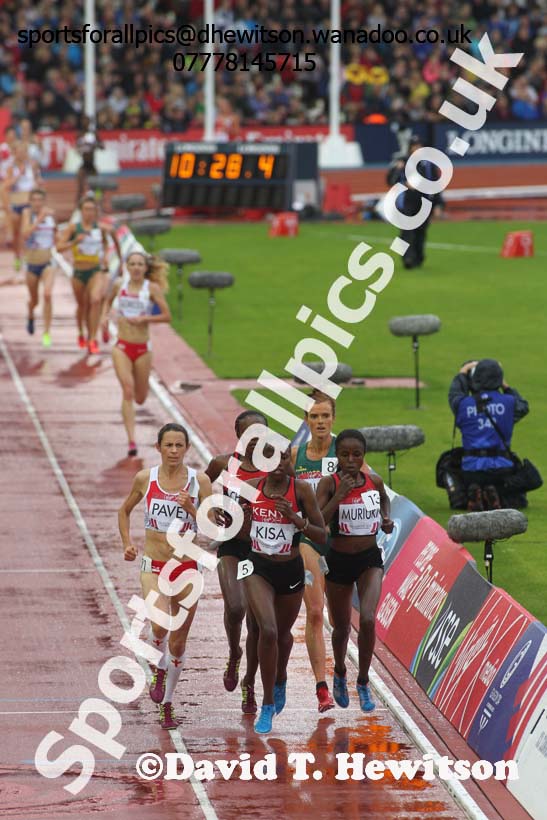 Jo Pavey (England), Janet KIsa and Margaret Muriuki (both Kenya) lead the womens 5000 metres at the Commonwealth Games, Glasgow. Photo: David T. Hewitson/Sports for All Pics